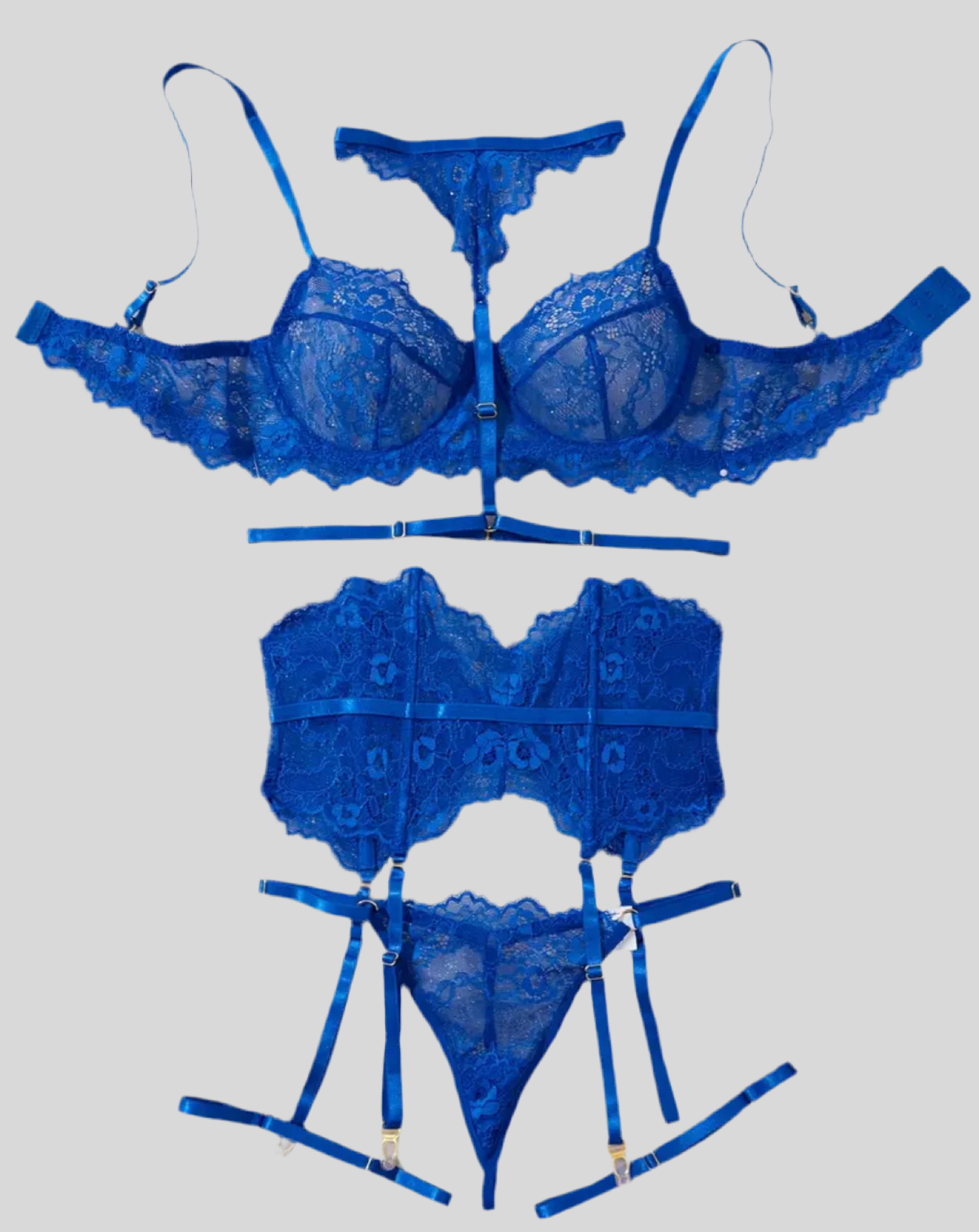 Conjunto de lencería de encaje con corset, ligas y ligueros.