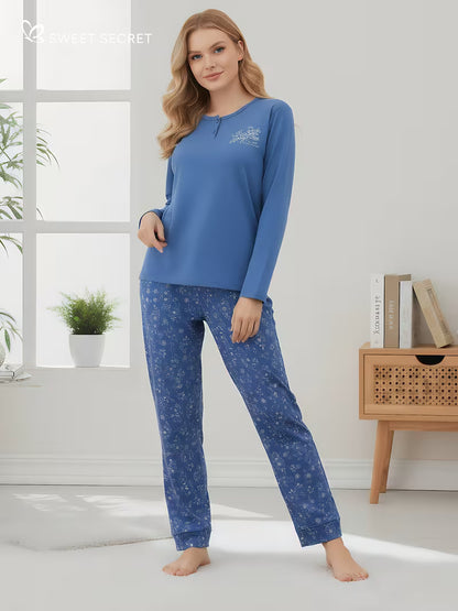 Conjunto de pijama en algodón cuello redondo, manga larga y pantalón